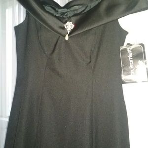 Long off the shoulder black dress.